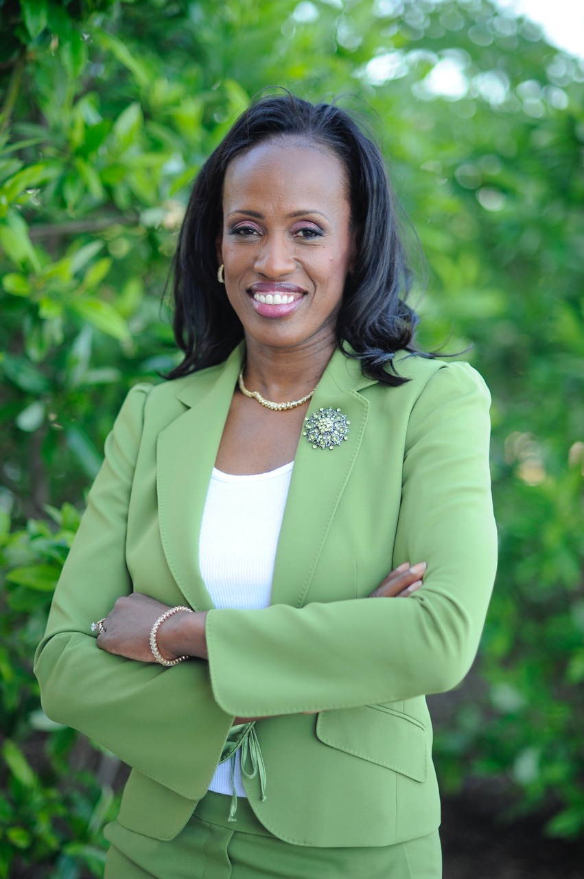 Jackie Joyner-Kersee stands with her arms crossed